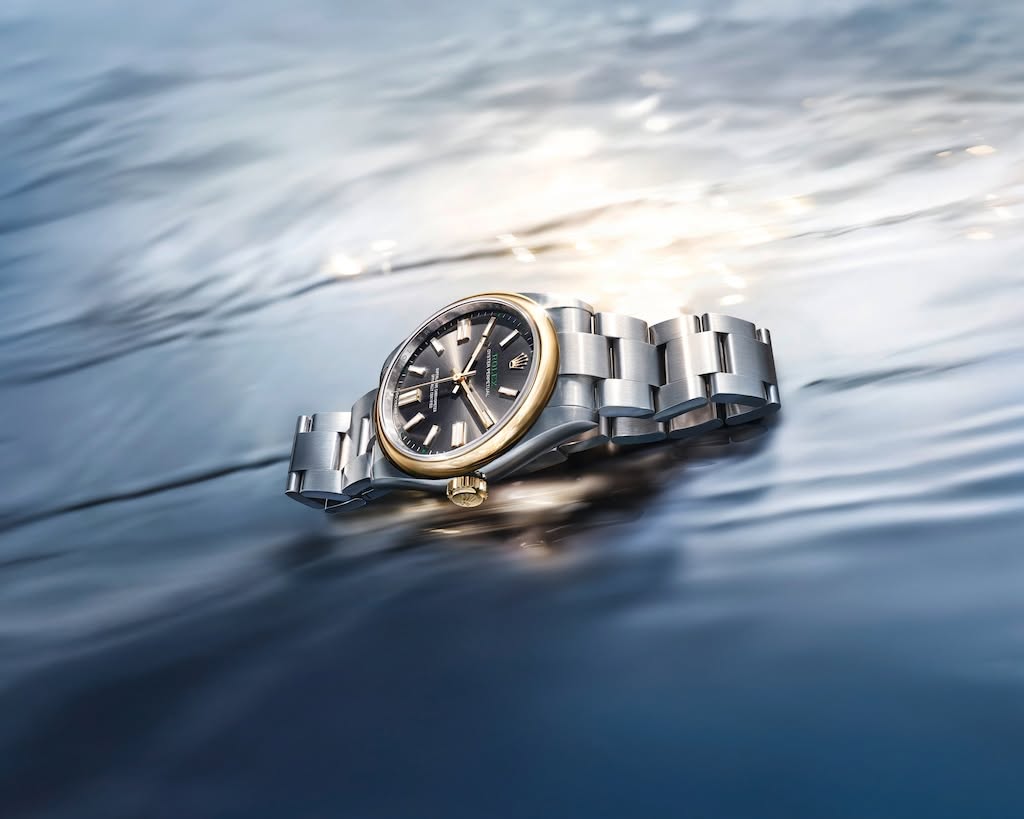 Rolex Oyster Perpetual Datejust 41 in two-tone steel with gold bezel and black dial