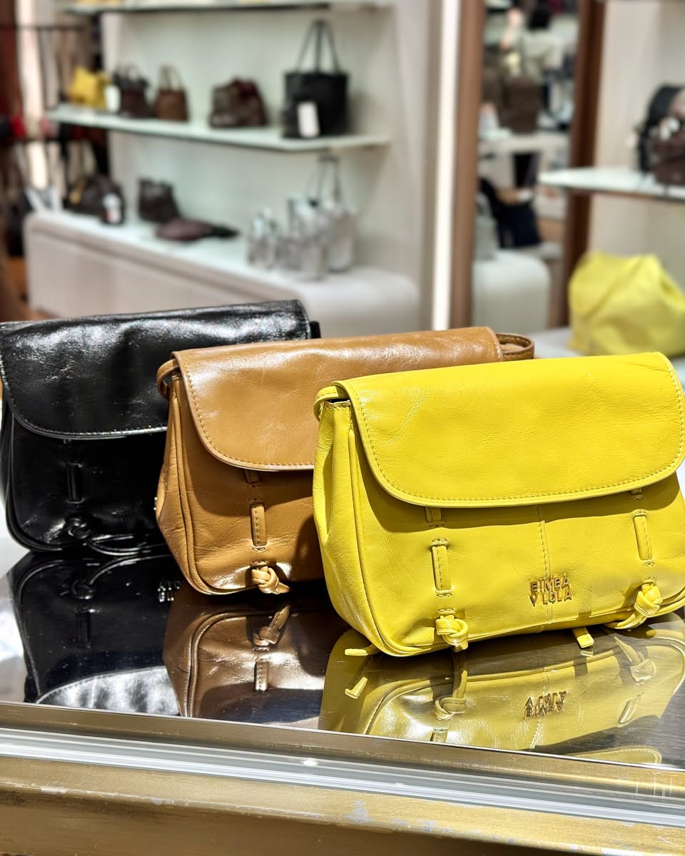 Furla leather satchel handbags in black, tan and yellow