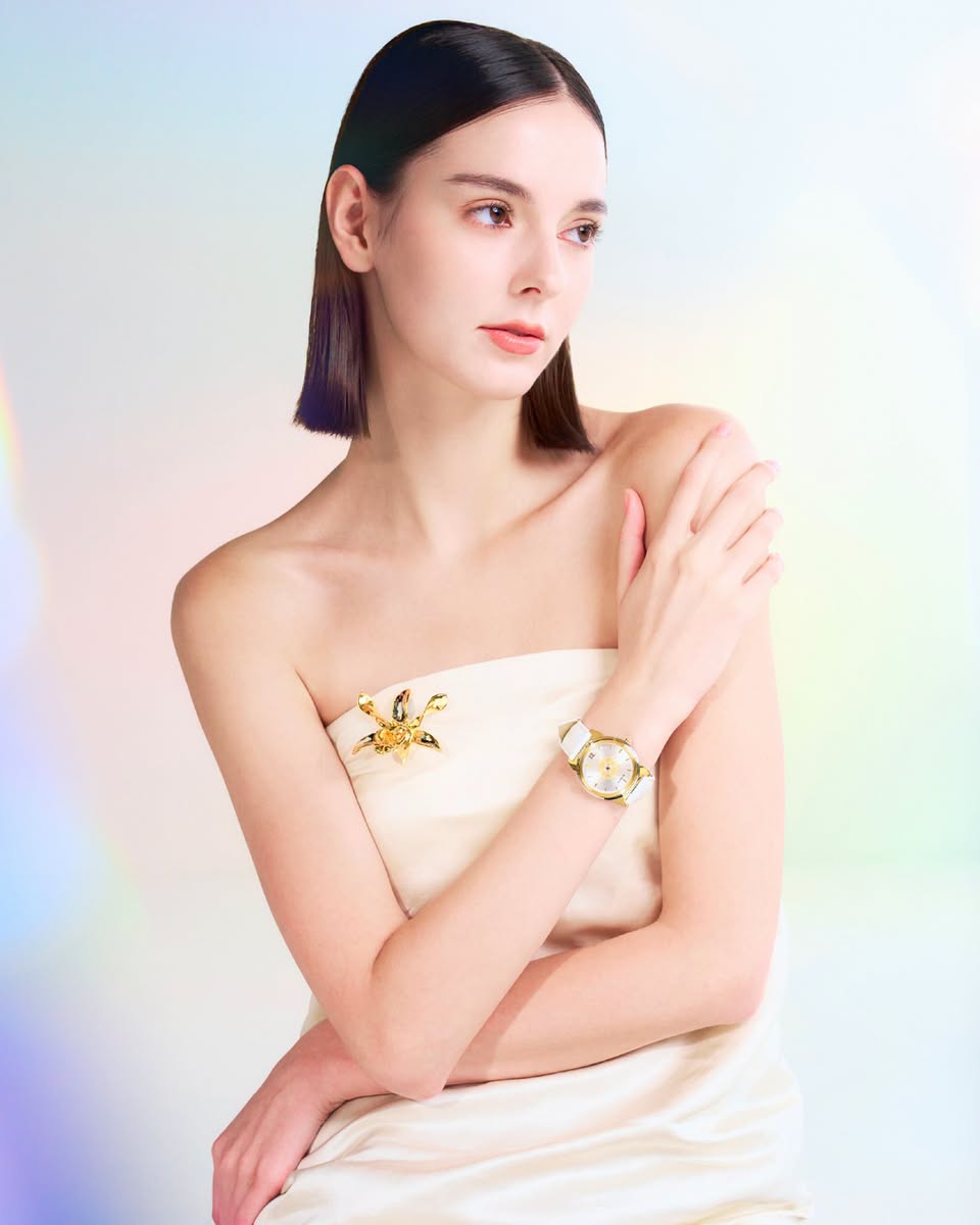 Risis Art Deco Overture gold floral brooches and wristwatch