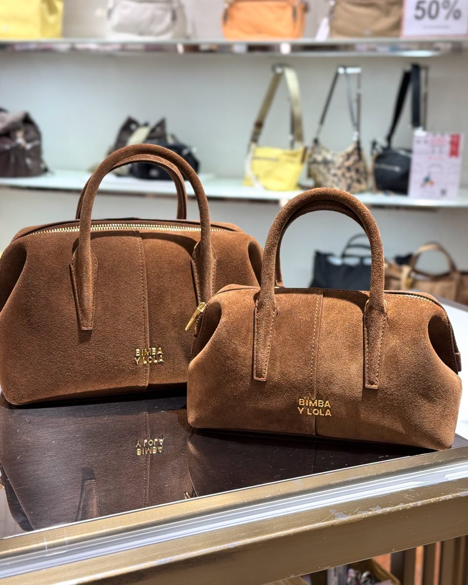 BIMBA Y LOLA brown suede handbags with gold zippers at 50% off