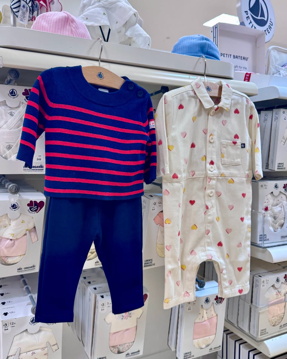 Petit Bateau baby garments on display