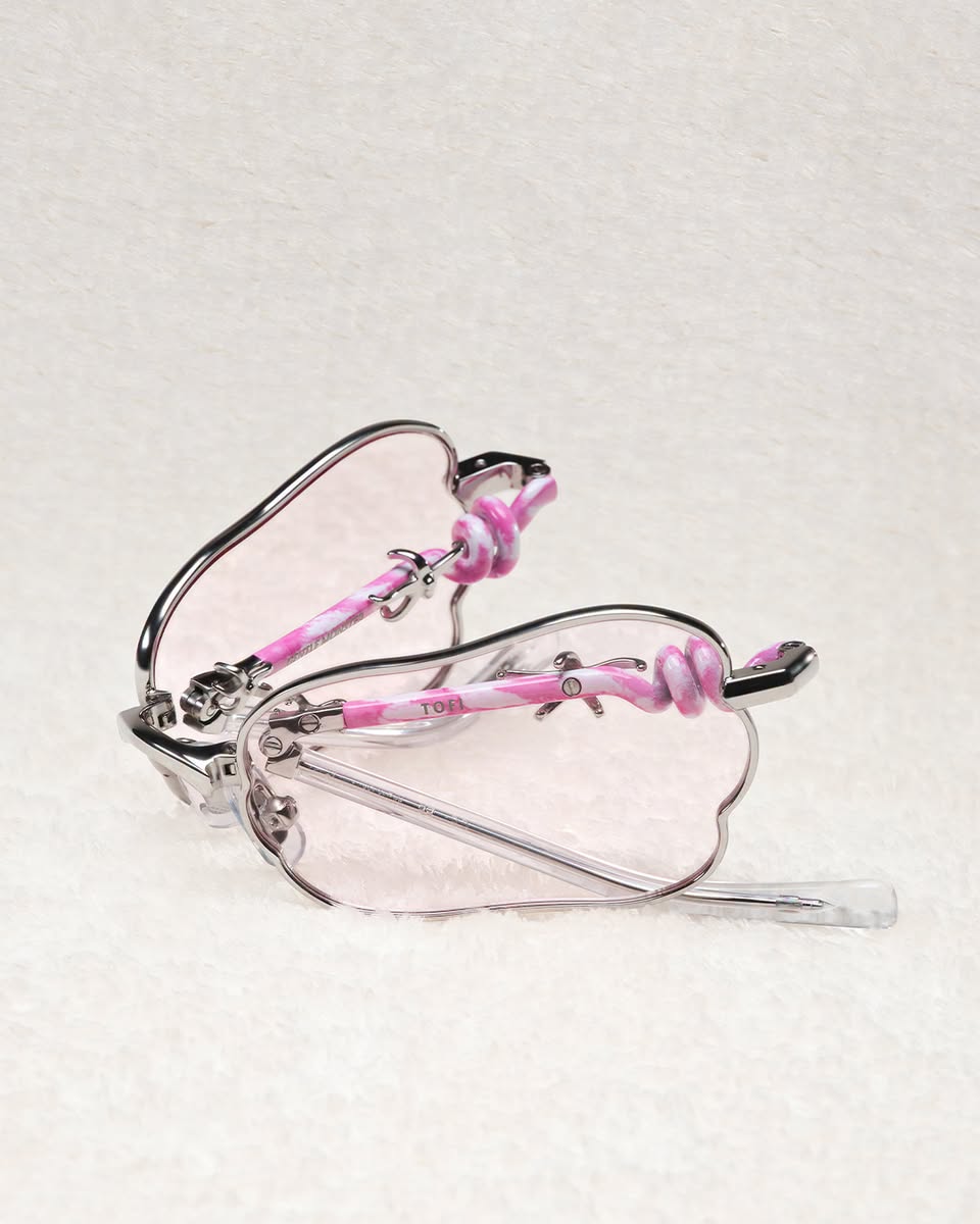 TOBI clear-frame glasses with pink patterned temples