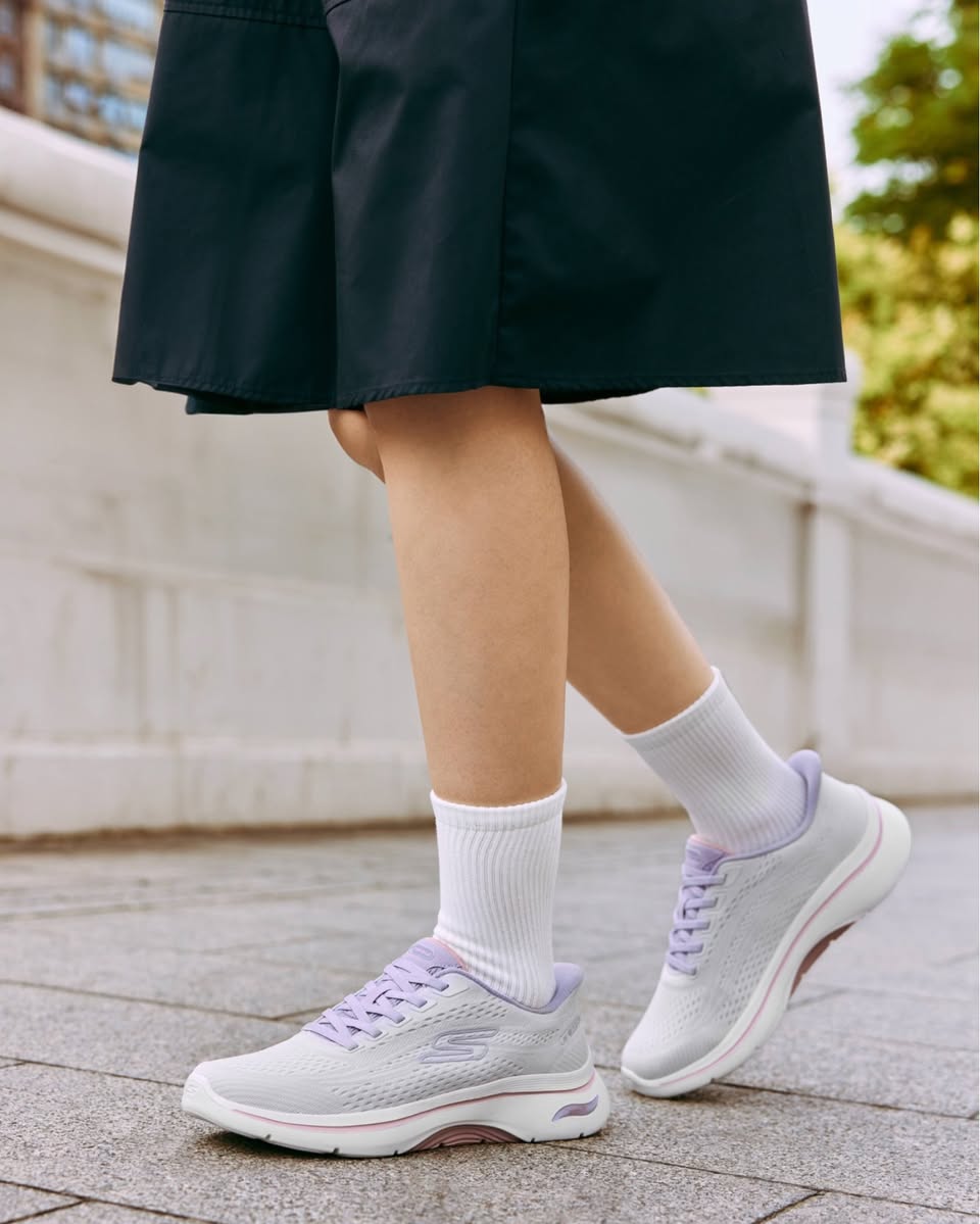 Skechers white sneakers with purple laces at Wisma Atria