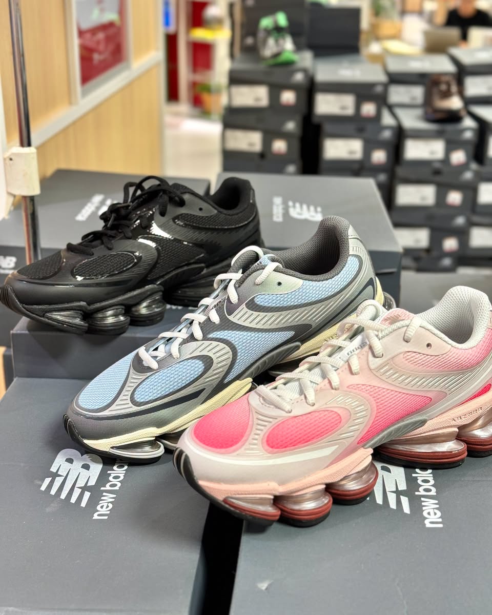 New Balance 990 series sneakers on display