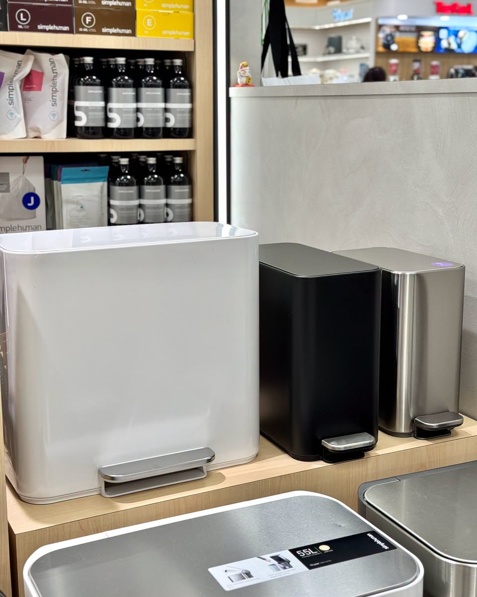simplehuman 58L foot-operated trash bins in white, black and stainless steel