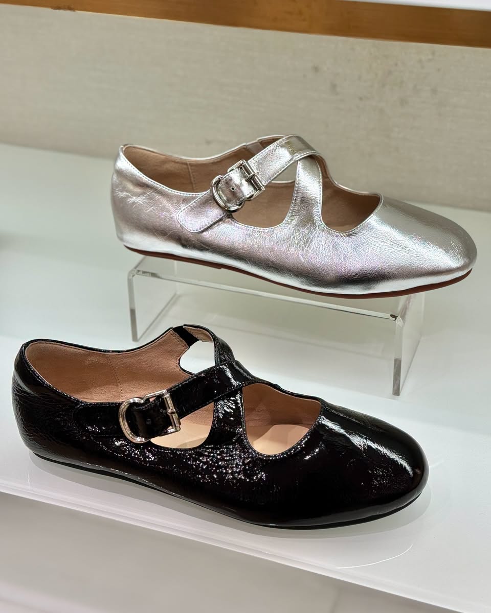 Metallic silver and black patent Mary Jane flats