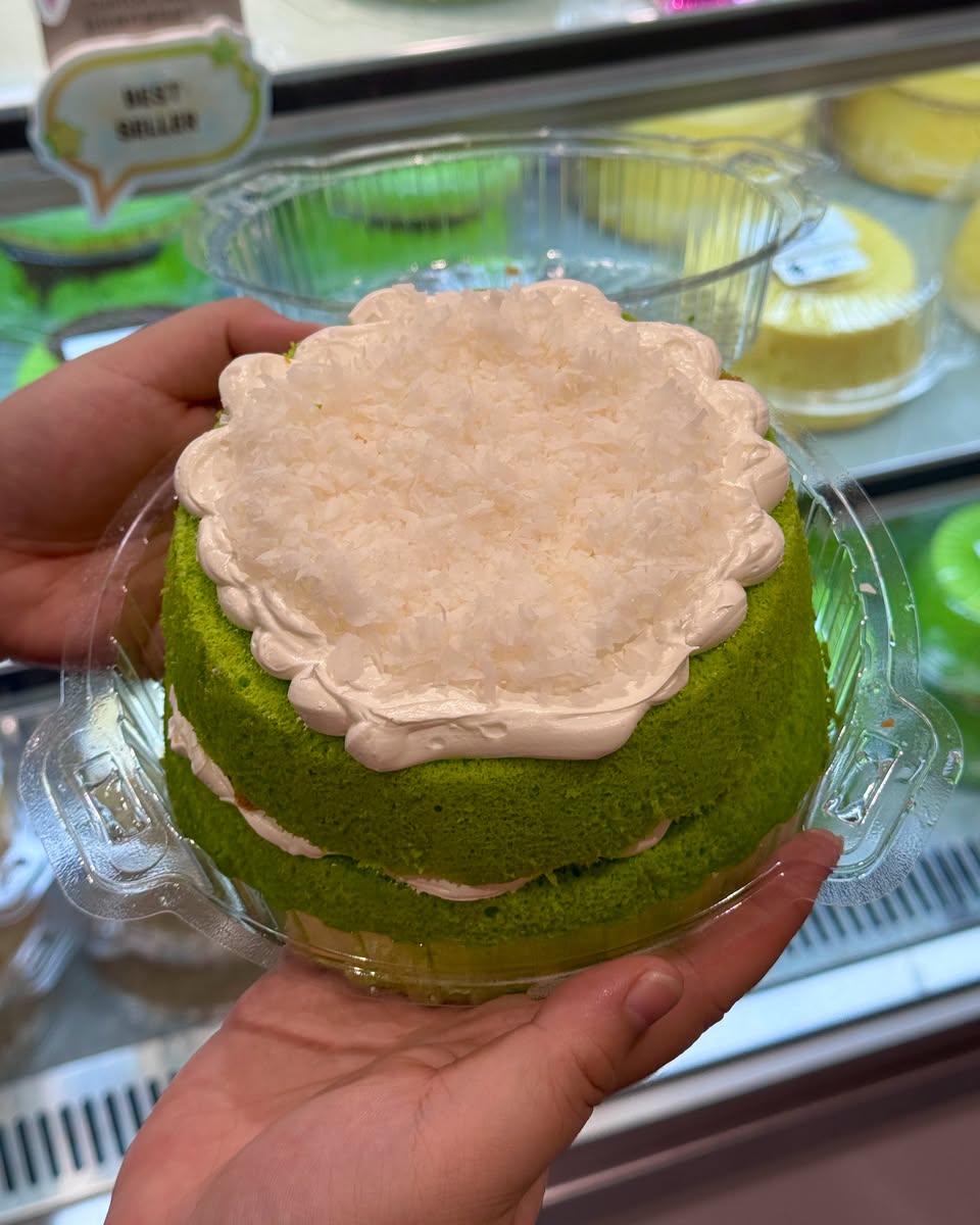 Green layered cake with coconut frosting from Mest Bakery