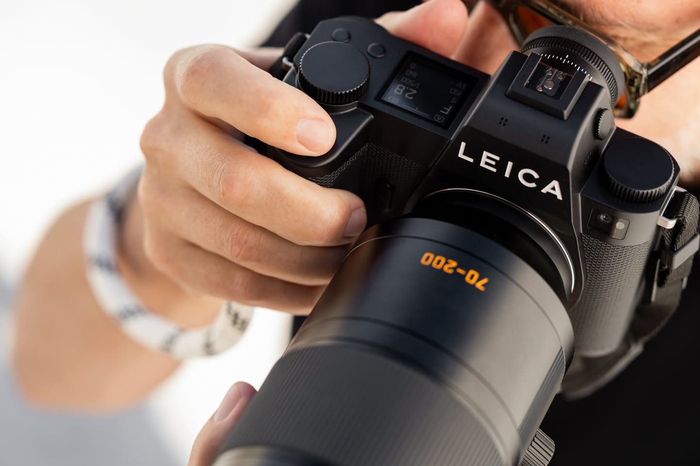 Leica camera with 70-200mm lens close-up