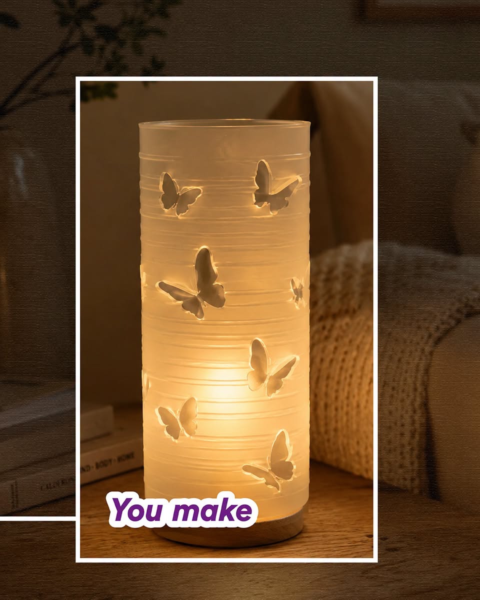 Butterfly-patterned LED candle holder made from recycled materials