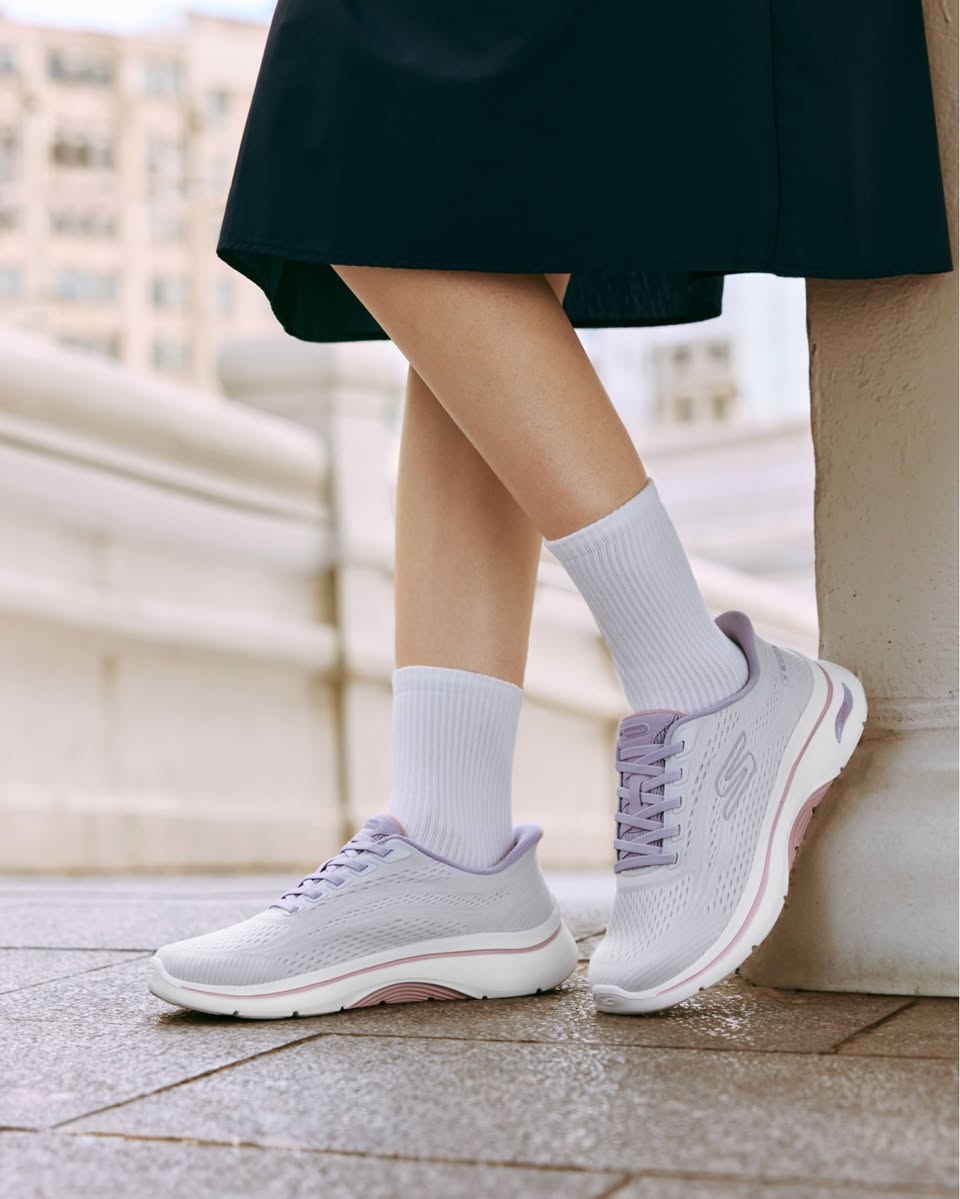 Skechers GOwalk Arch Fit 2.0 white mesh sneakers with purple laces