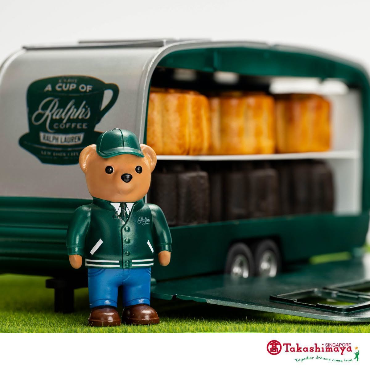 Ralph's Coffee delivery truck with bear figurine