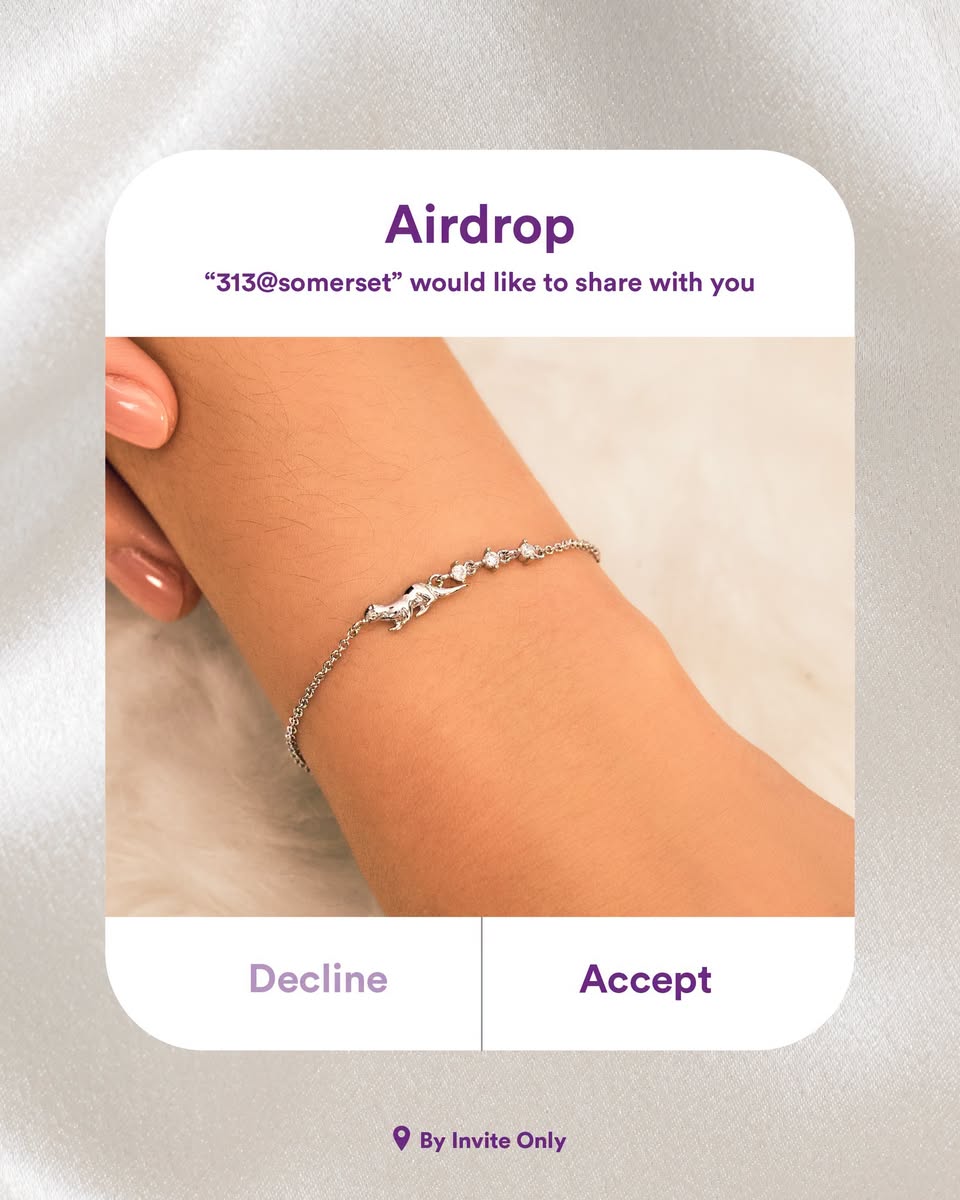 Silver chain bracelet with charms from By Invite Only