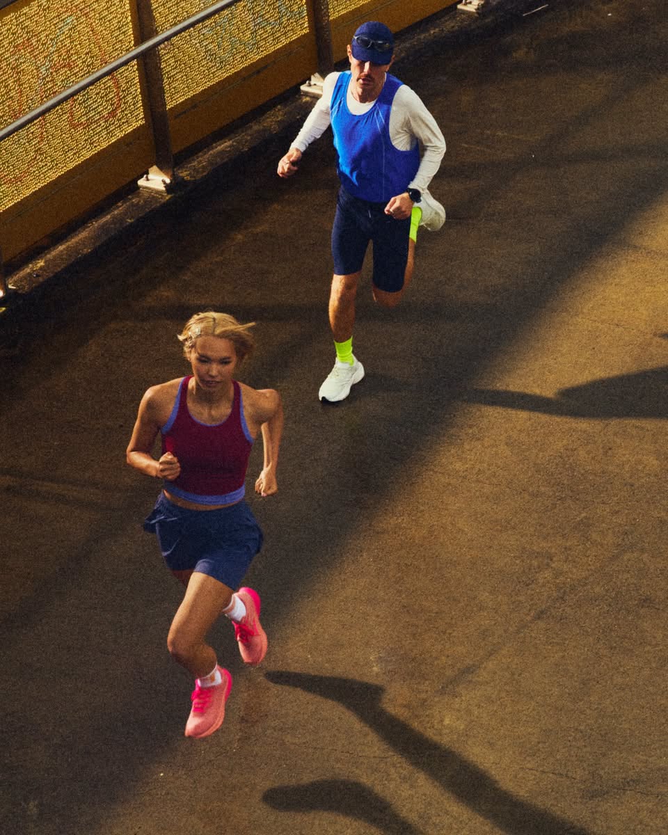 Runners in motion wearing lululemon athletic gear at night