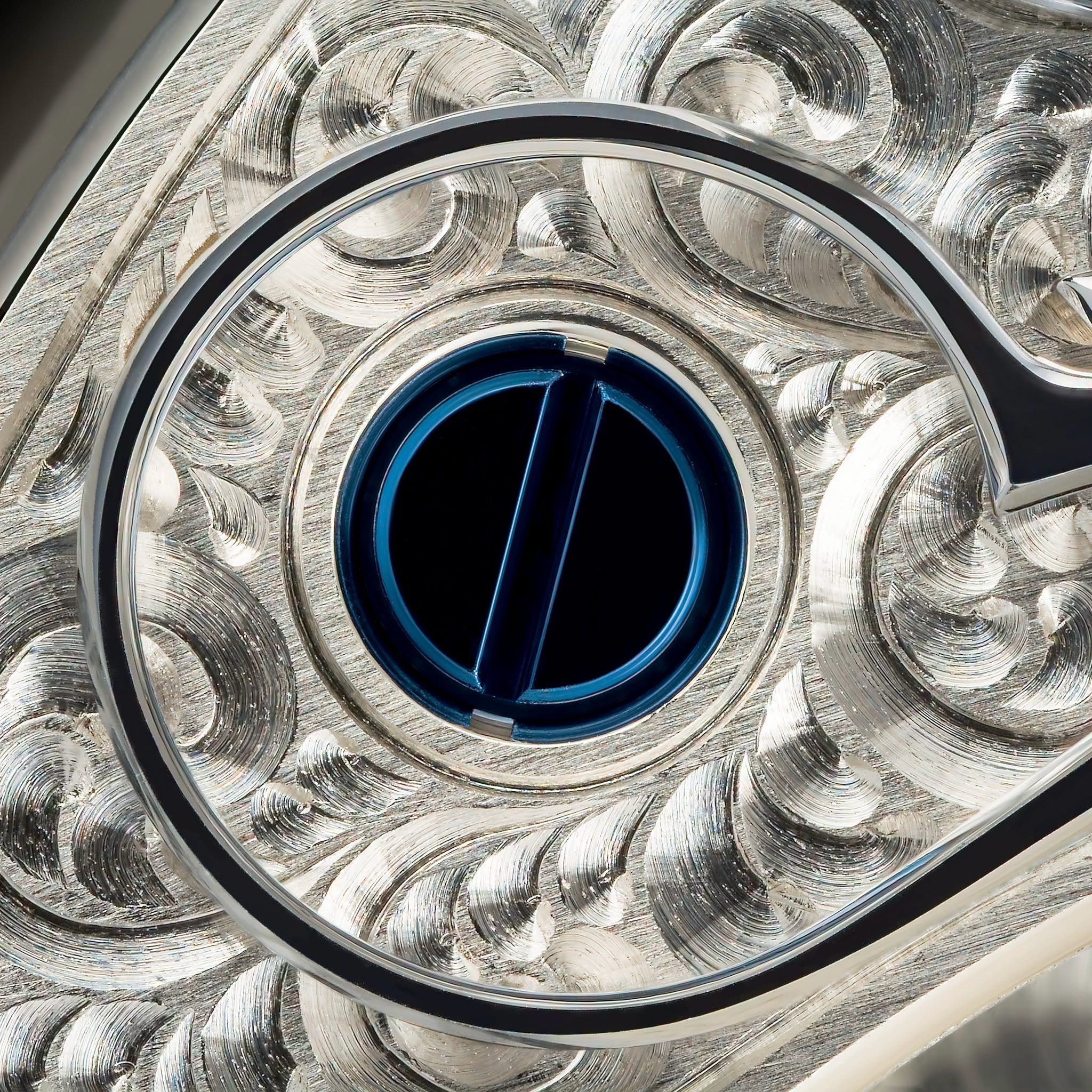 Close-up of ornate engraved balance cock detail
