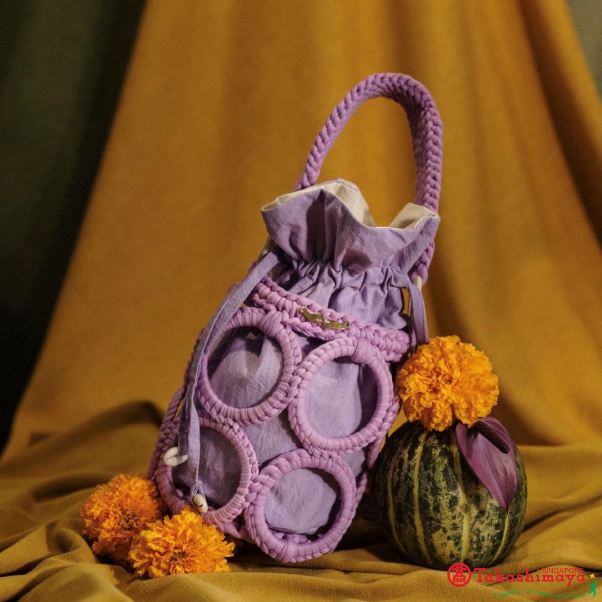 Webeings lavender drawstring bag with macrame detailing