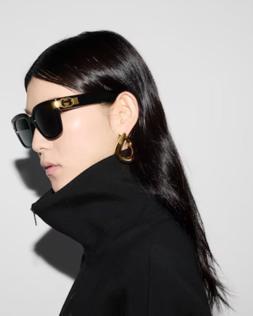 Gucci sunglasses with gold-tone frame and double-G logo