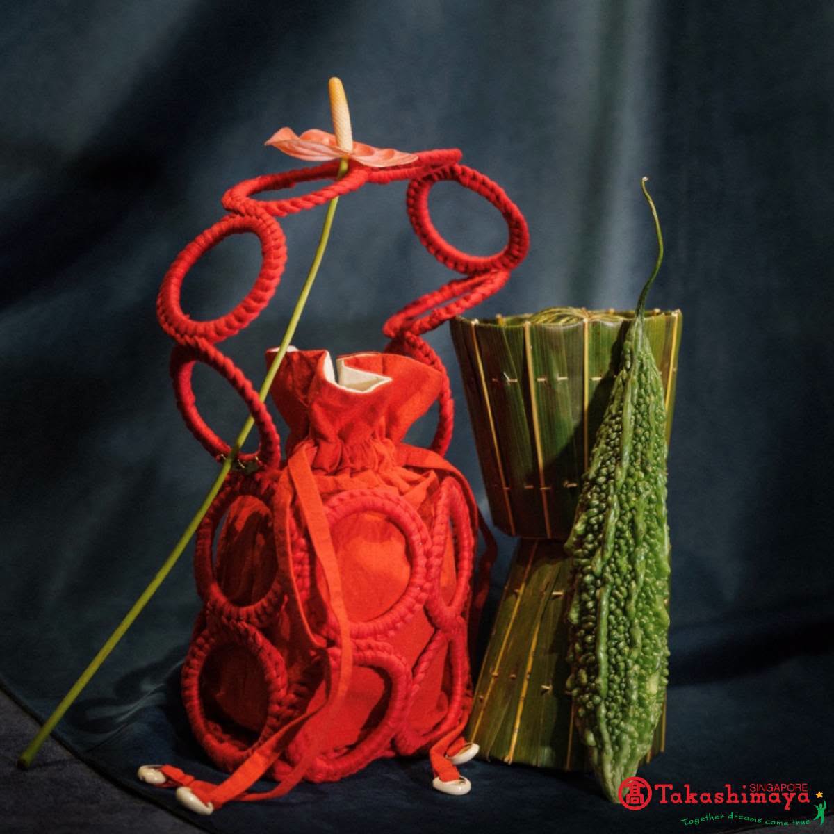 Red rope-woven bag with white accents from Webeings
