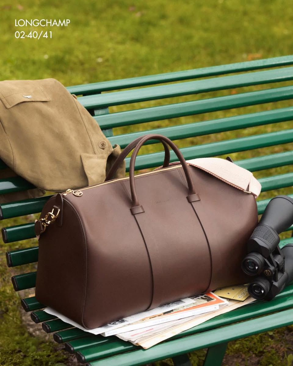 Longchamp brown leather duffel bag and beige canvas backpack