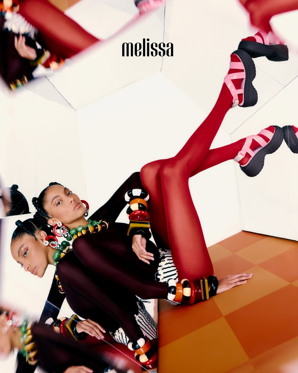 Melissa red strappy platform sandals and chunky bracelets
