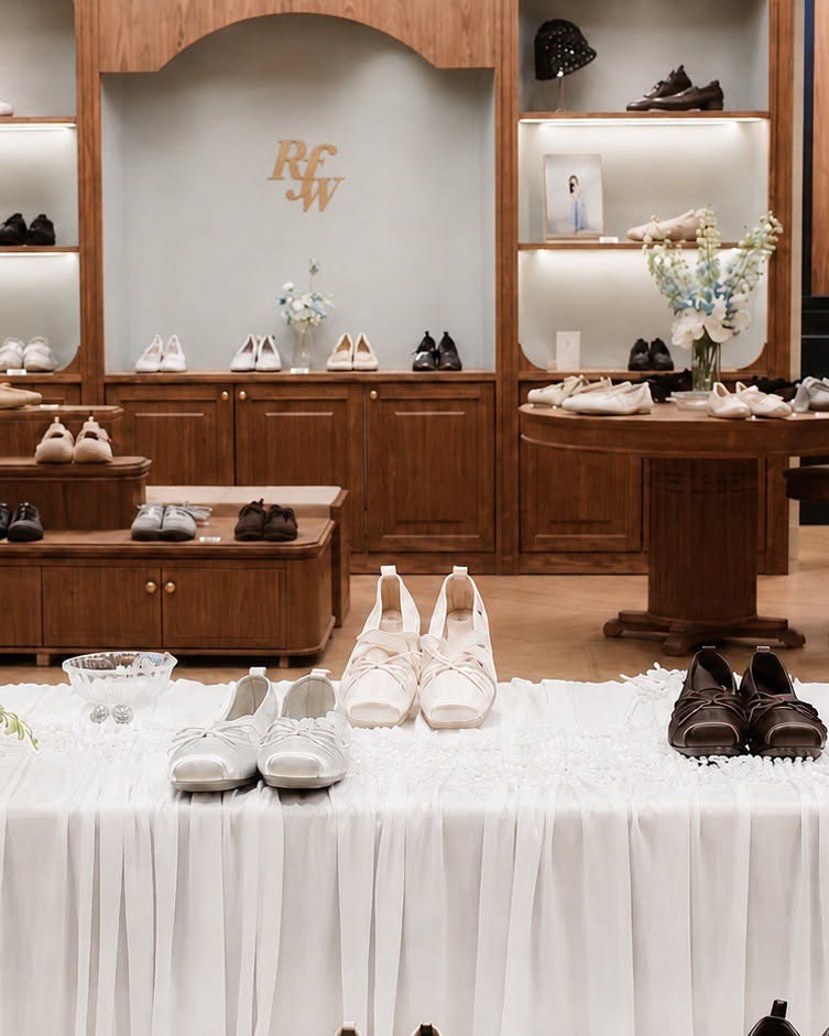 Rockfish Weatherwear RFW footwear display with sandals, loafers and heels