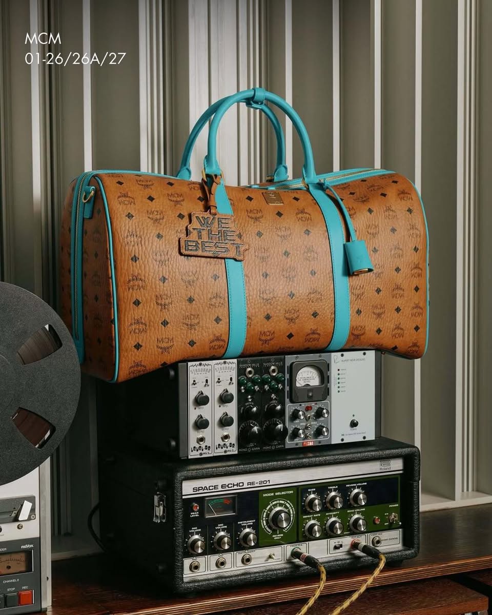 MCM WE THE BEST duffel bag display at Paragon
