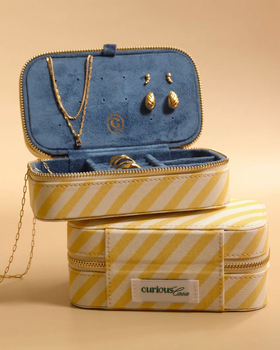 Yellow-and-white striped jewellery organizer box with blue suede interior from Curious Casa