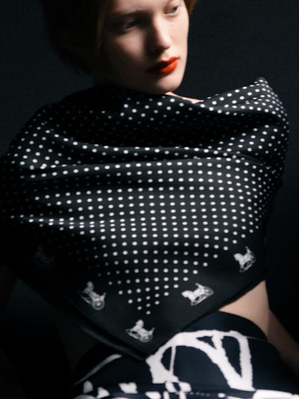 Black polka dot scarf with animal motifs