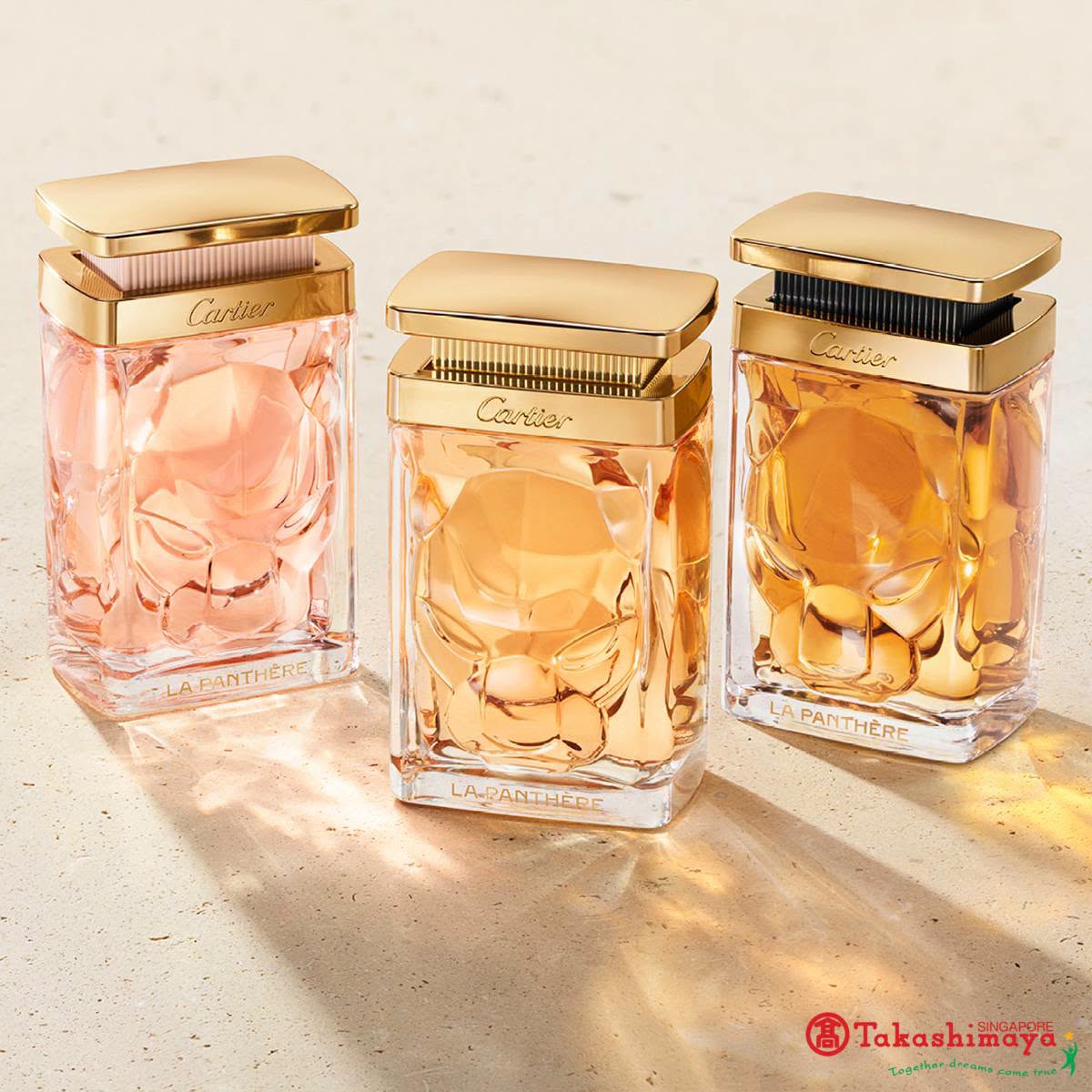 Cartier La Panthère perfume bottles in pink, gold, and amber shades