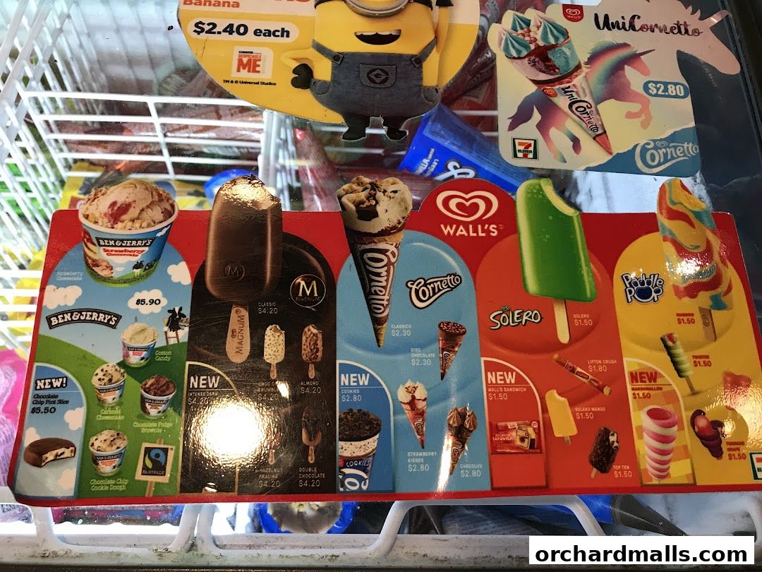 A display of various ice cream brands and flavors available for purchase.