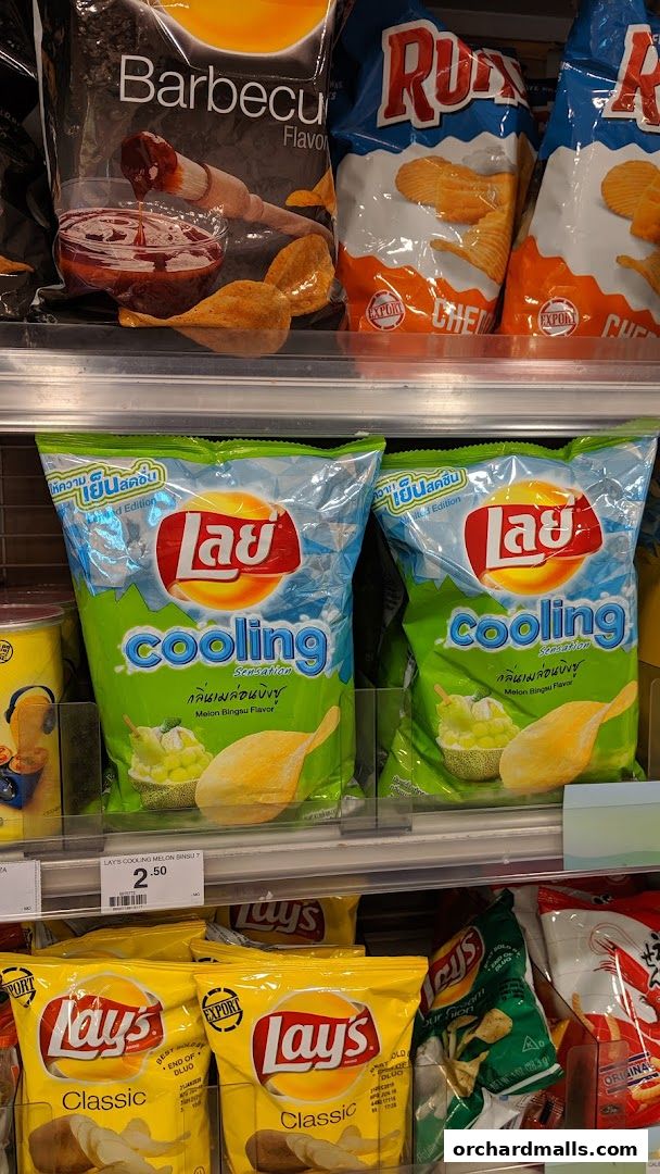 A selection of potato chip bags, including Lay's Cooling Melon Bingsu and Lay's Classic flavors.