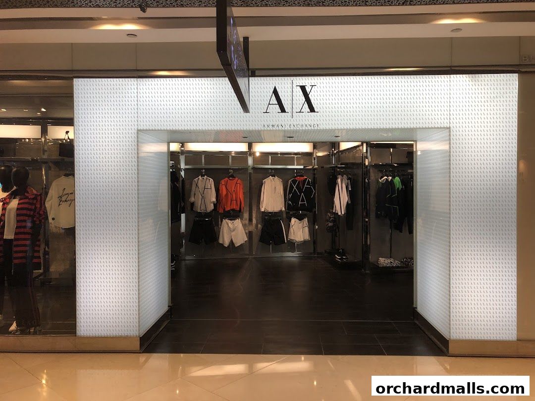 The entrance of an AX Armani Exchange store showcasing stylish men's apparel on display.