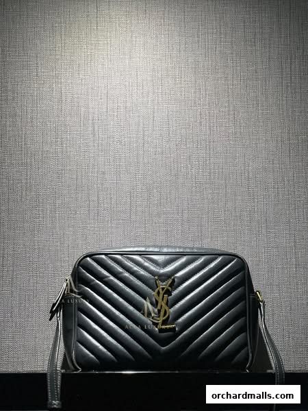 A black quilted leather handbag with a gold YSL logo is displayed.