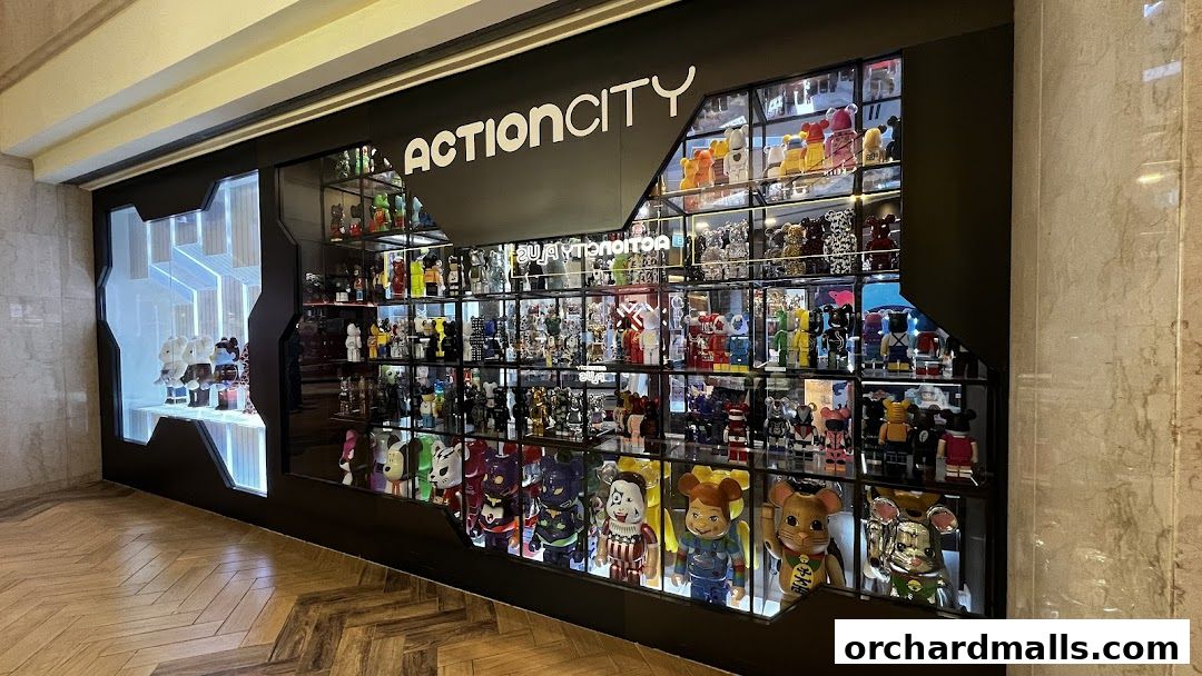 ActionCity store display featuring numerous collectible designer toys on shelves.