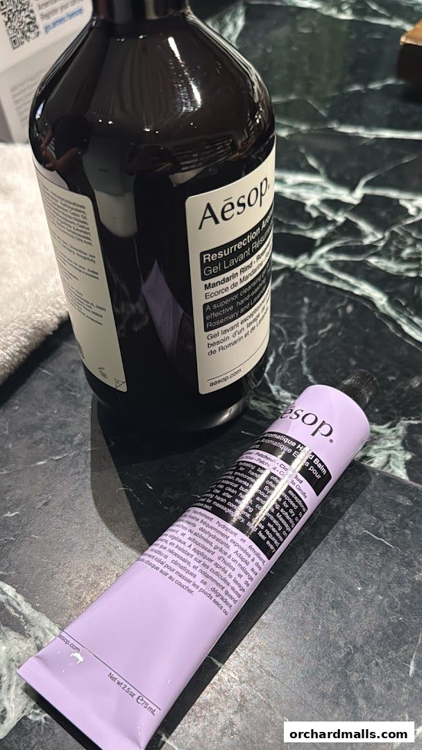 Aesop Resurrection Aromatique Hand Balm and a large bottle of hand wash.