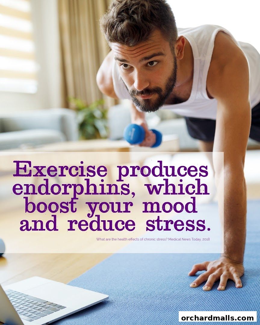 Man exercising with dumbbells, promoting mood boost and stress reduction.
