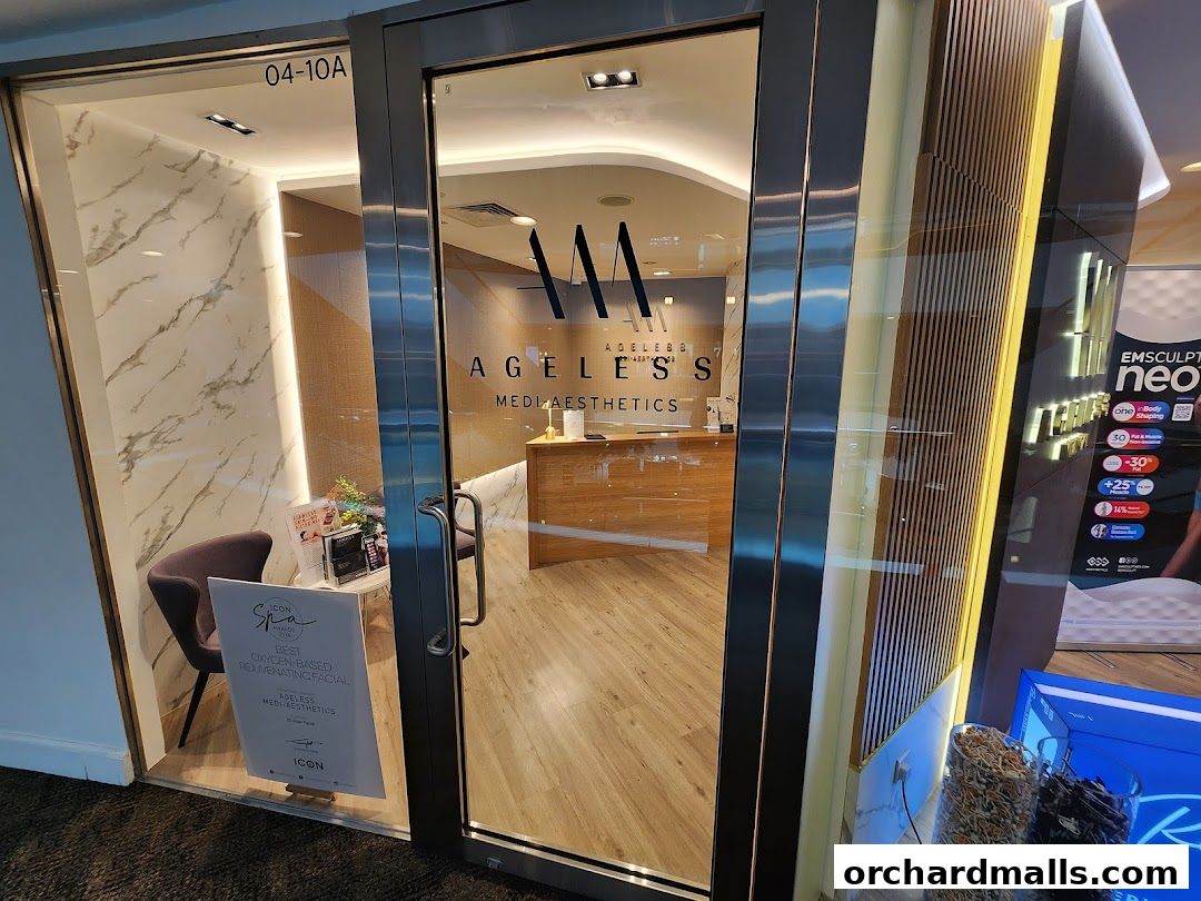 The entrance of Ageless Medical Medi-Aesthetics, a modern clinic with marble accents and a reception desk.