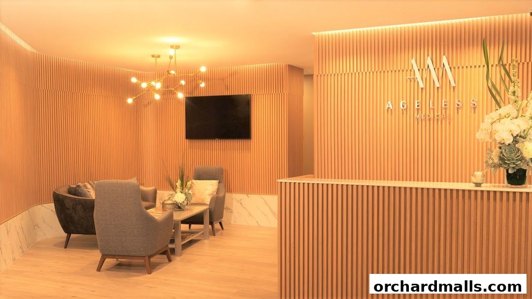 The reception area of Ageless Medical features a modern design with wood paneling and comfortable seating.