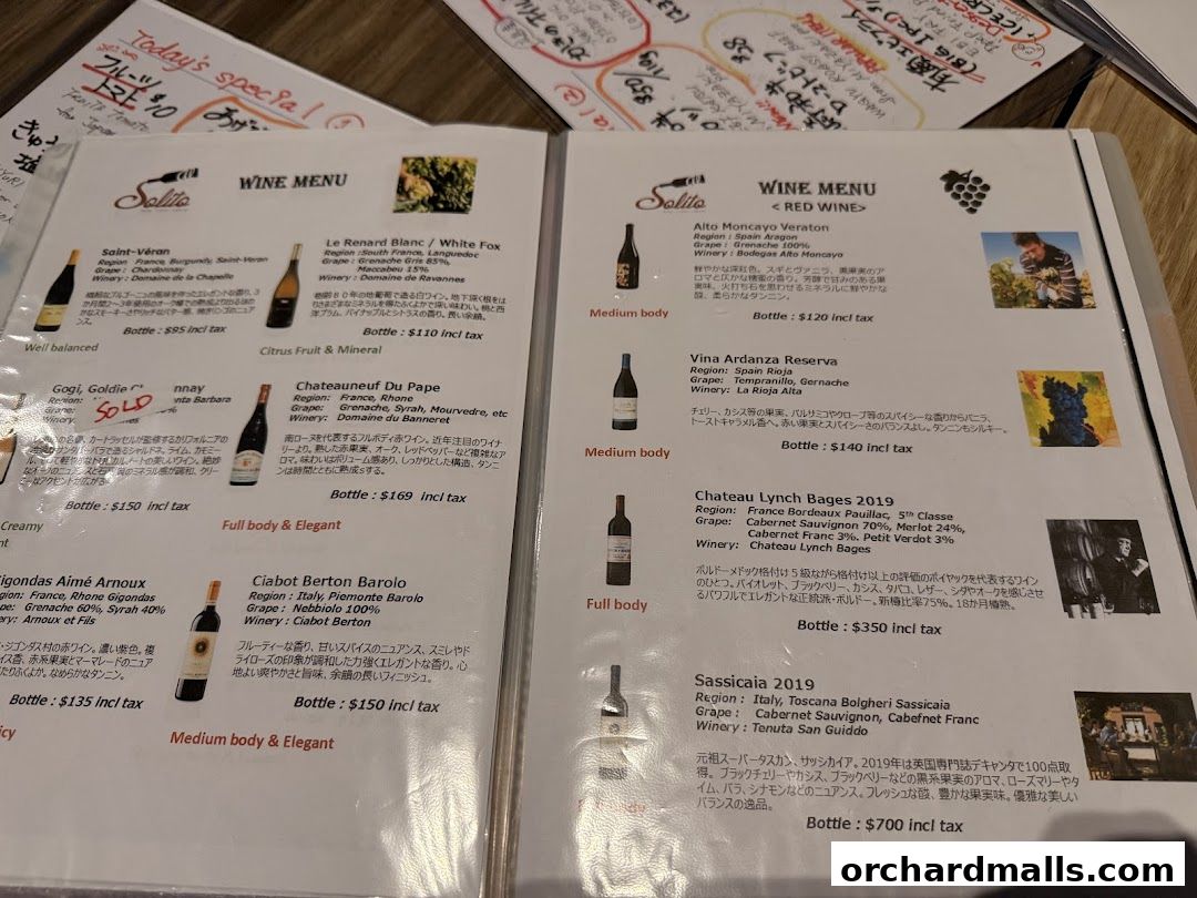 A wine menu from AL Solito Japanese Italian izakaya featuring red and white wines.