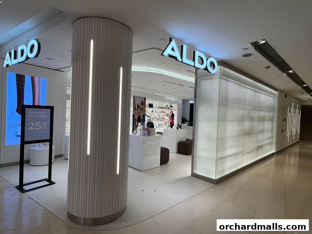 The ALDO shoe store features a modern, illuminated facade with prominent signage and displays.