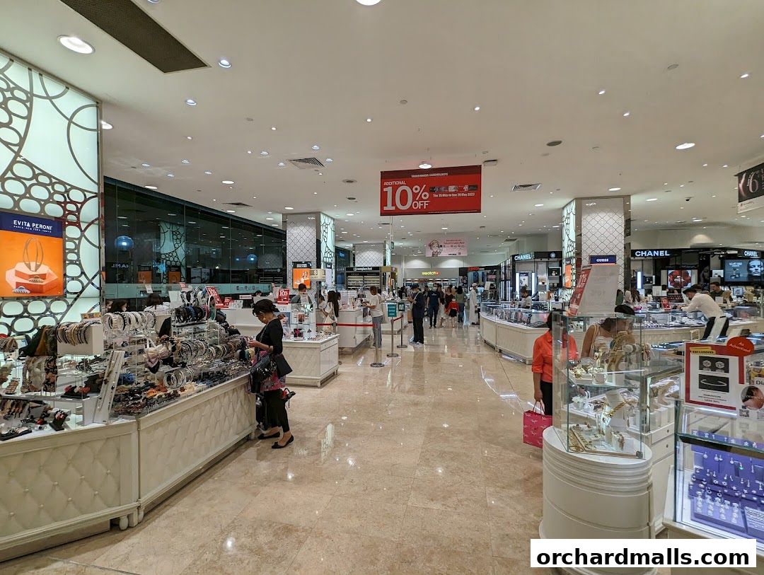Interior view of a well-lit retail store with various accessories and jewelry displays.