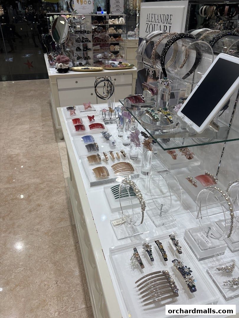 A display of elegant hair accessories, including headbands, combs, and clips, at Alexandre Zouari.