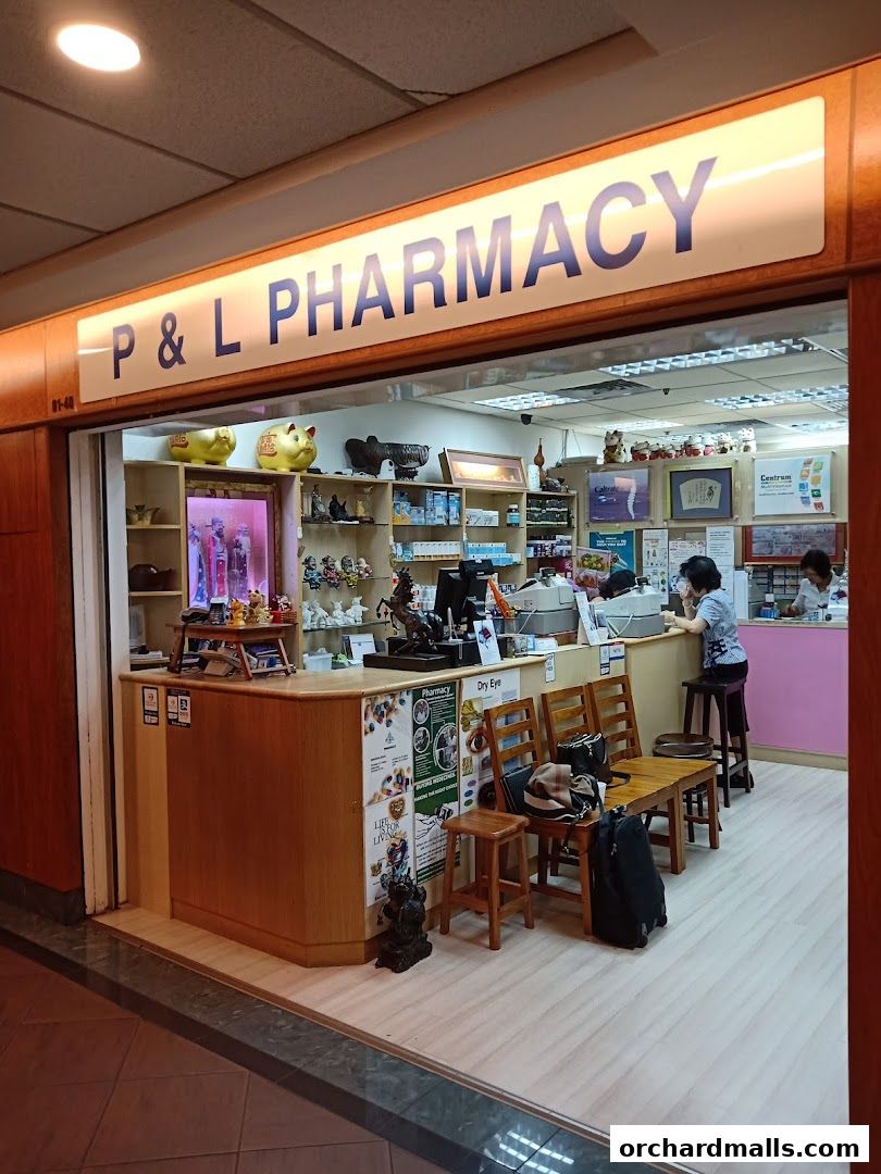 The exterior of P&L Pharmacy, showcasing its entrance, counter, and interior.