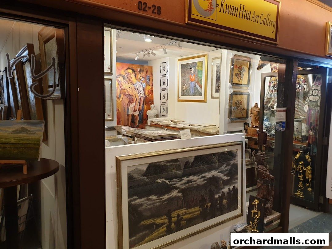 Exterior view of Kwan Hua Art Gallery showcasing various paintings and sculptures.