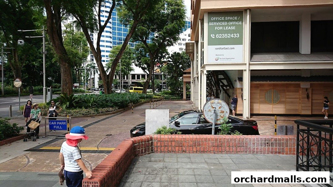 Exterior view of Andric Leasing with an advertisement for office space for lease.