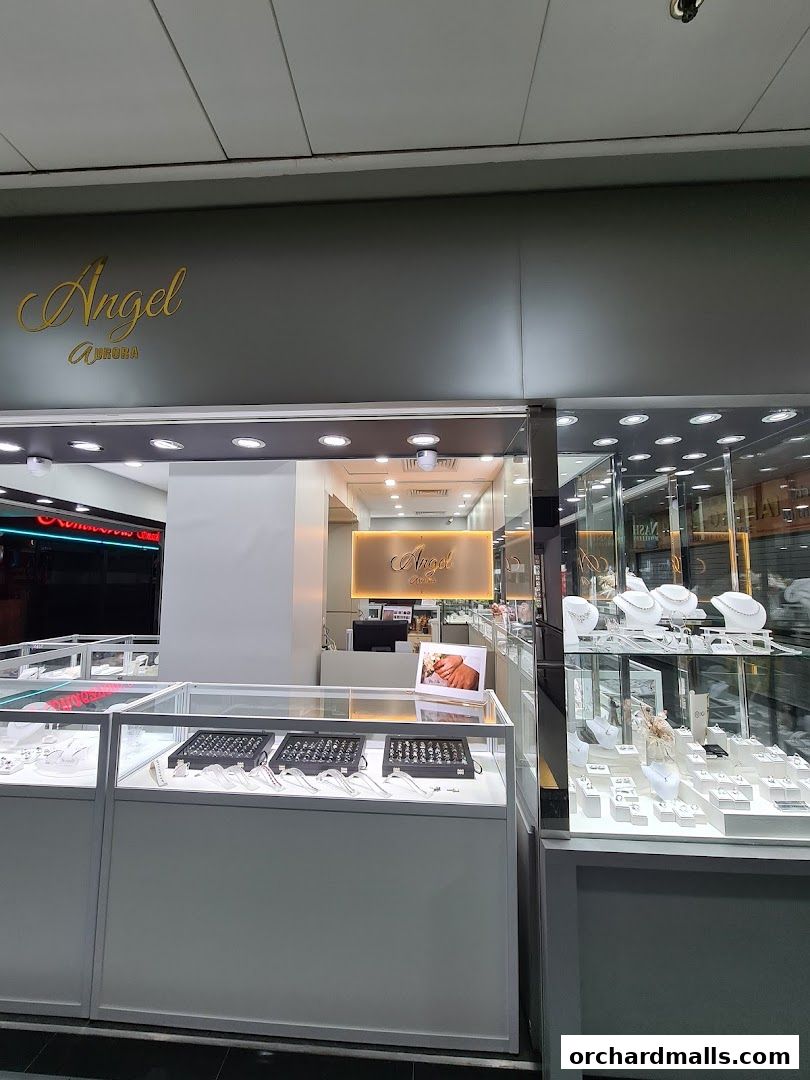 Angelaurora Jewelry shop front with display cases filled with jewelry.