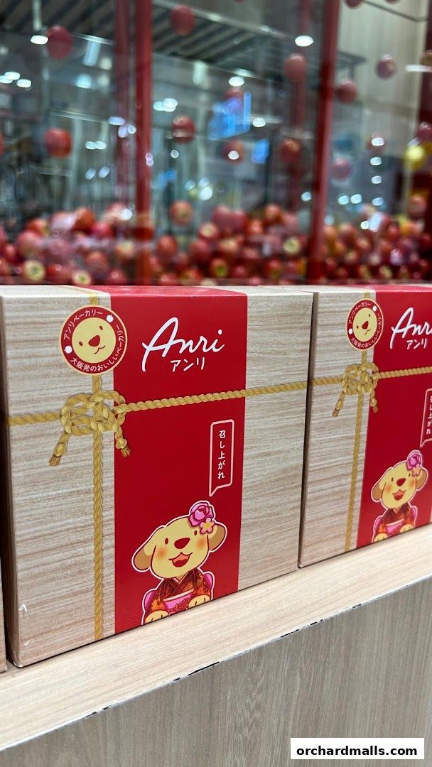 Gift boxes from Anri bakery featuring a cute dog character in a kimono.