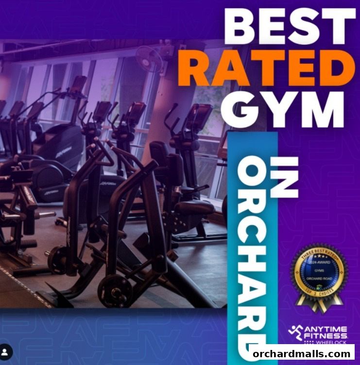 Interior of a gym with cardio machines and a 'Best Rated Gym' award.