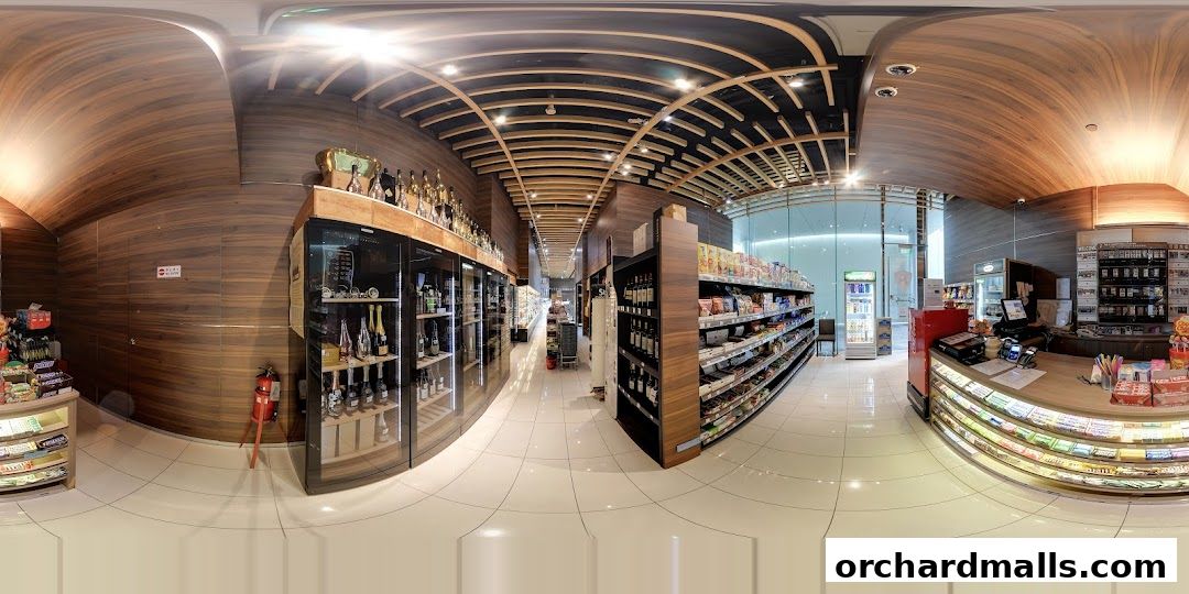 Interior view of AP House convenience store with shelves stocked with drinks, snacks, and alcoholic beverages.