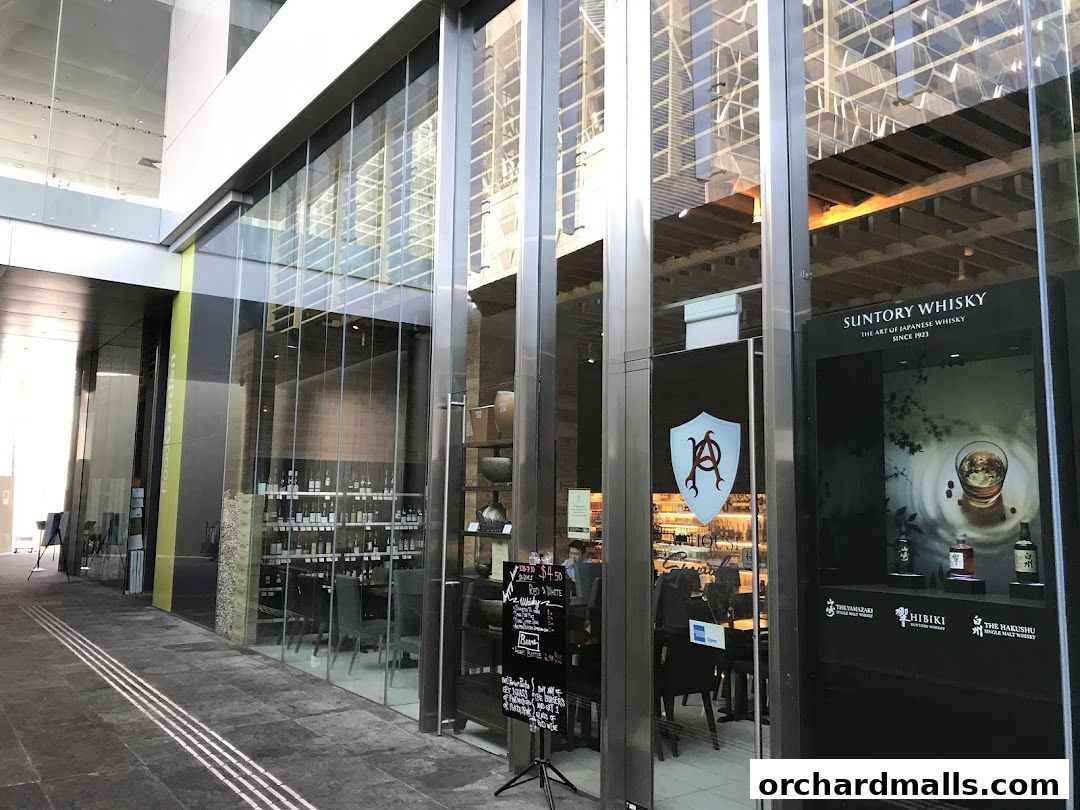 Exterior view of AP House, a shop specializing in Suntory Whisky and other beverages.