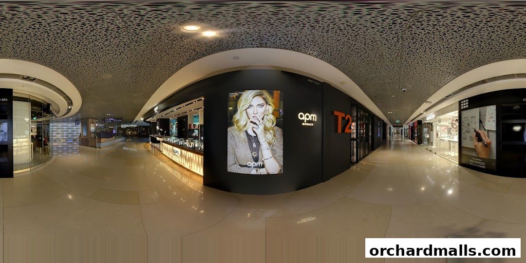 Interior view of APM Monaco Singapore ION Orchard shop with a large advertisement.